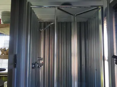 a shower in a bathroom with a shower curtain at Sians Retreat, Bowness on Solway, perfect stop over when walking Hadrians Wall with hot tub in Bowness-on-Solway