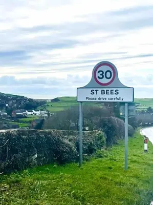 a sign for st bees on the side of a road at Normsy Place Seaside Serenity Breath Taking Views in St Bees