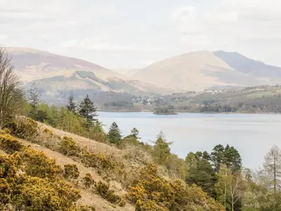 a view of a lake with mountains in the background at Apartment 4 Skiddaw in Keswick