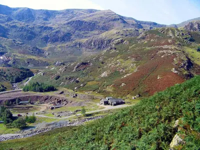 a house on the side of a mountain at The Mountain Cottages - Millrace in Coniston