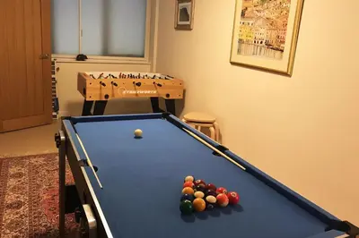 a pool table with balls on it in a room at Herdwick Place Langdale Valley in Great Langdale