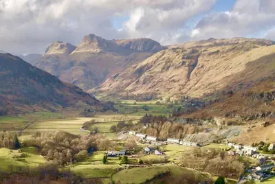 a view of a valley with mountains in the background at Herdwick Place Langdale Valley in Great Langdale