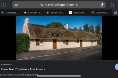 a screenshot of a building with a thatch roof at Stunning Refurbished 1 Bedroom, Harbour Apartment. in Ayr