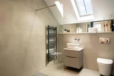 a bathroom with a toilet and a sink at Daisy Cottage, Dalston, peaceful, rural setting with garden & hot tub in Carlisle
