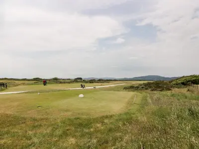 a view of a golf course with a green field at Dershel Lodge in Dumfries