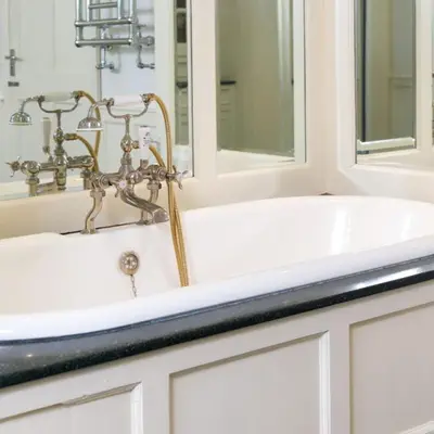 a bathroom with a sink and a faucet at Bramrigg House in Grasmere