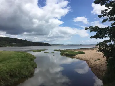 a view of a river on a cloudy day at Birchlea in Kippford