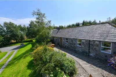 an overhead view of a stone house with a garden at Popsal in Kirkcowan