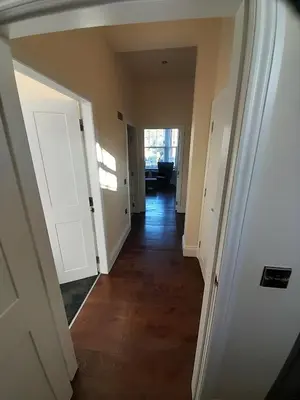 a hallway of a house with a door and a room at Kirkcudbright Holiday Apartments - Apartment C in Kirkcudbright
