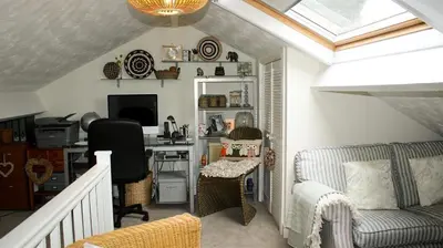 a home office with a desk and a computer at Spacious Holiday Home in Cumbria in Arlecdon